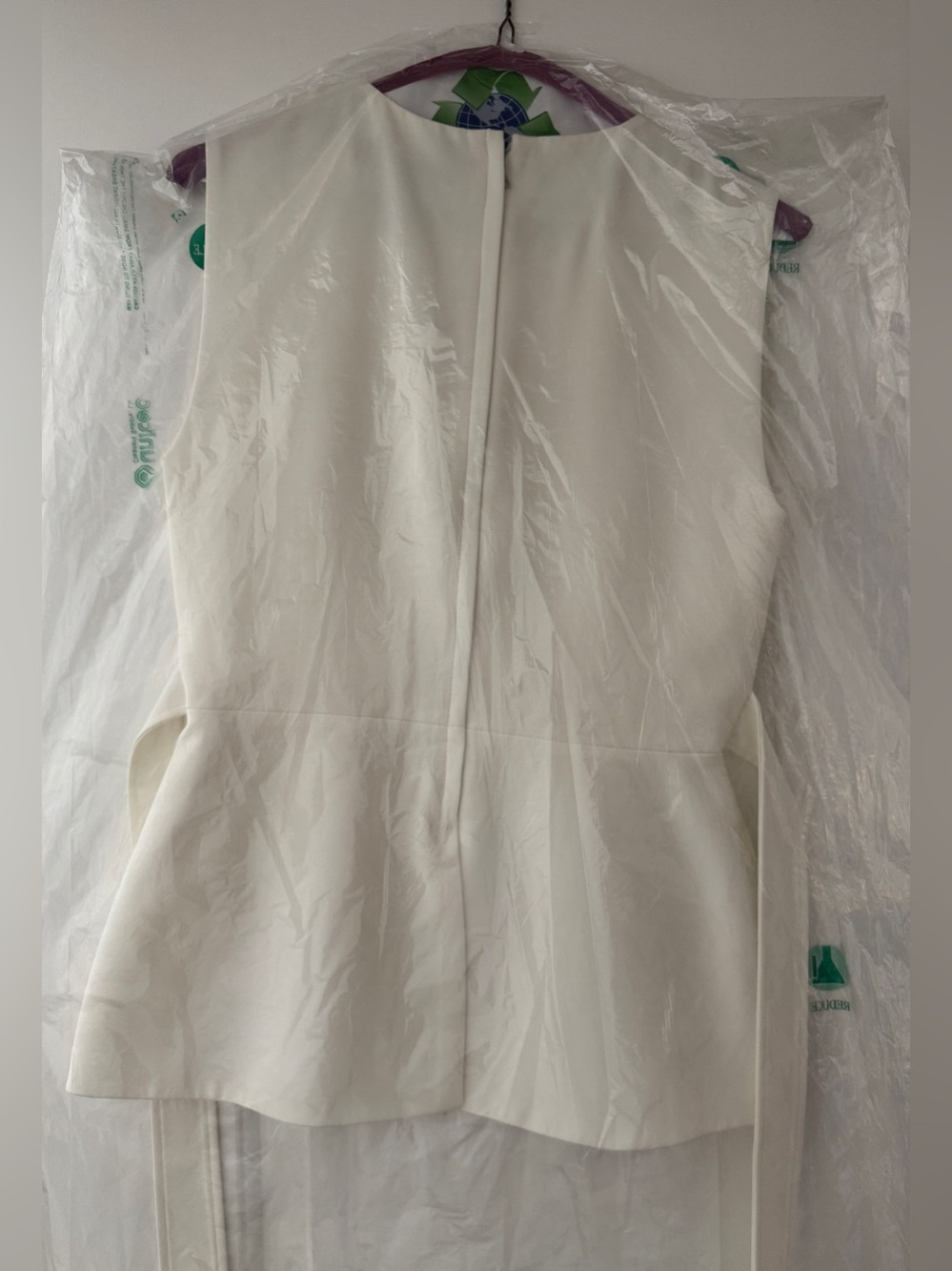 BCBGMaxAzria Women’s Ivory Sleeveless Décolleté Peplum Top - Picture 10 of 10